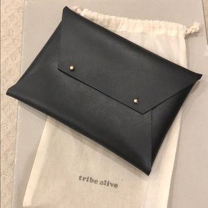 Tribe Alive black pouch clutch